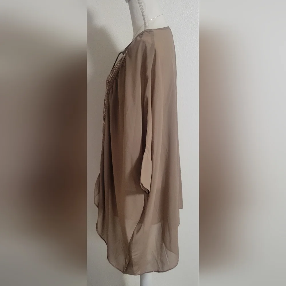 Free People embroidered oversized with tassel details boho style top size small